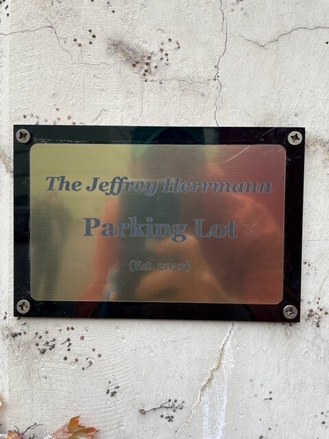 The Jeffrey Herrmann Parking Lot (Est. 2022)